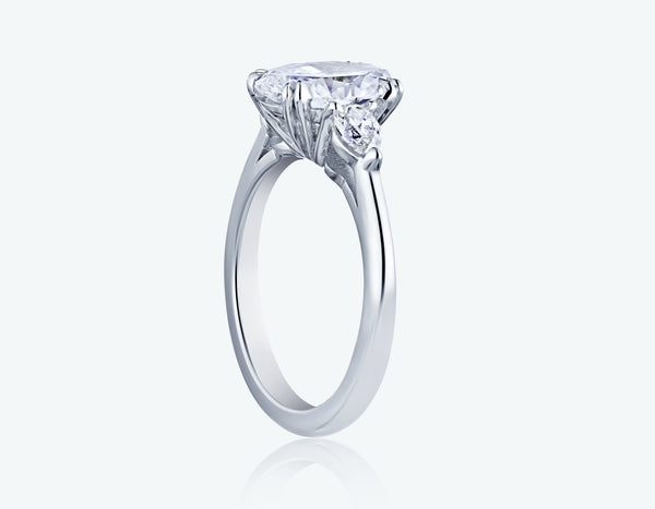 Oval Diamond with Pear side stones