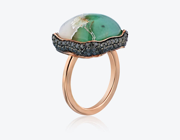 aquaprase ring set in rose gold with black diamonds