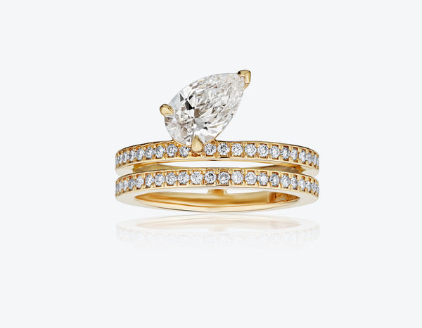 Asymmetrical Pear Diamond Ring